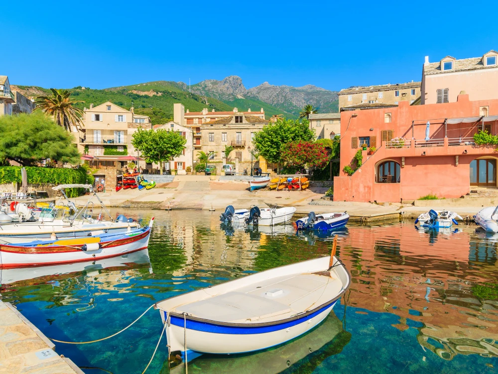 Colorful fishing boats in Erbalunga port on Cap Corse, Corsica island, France