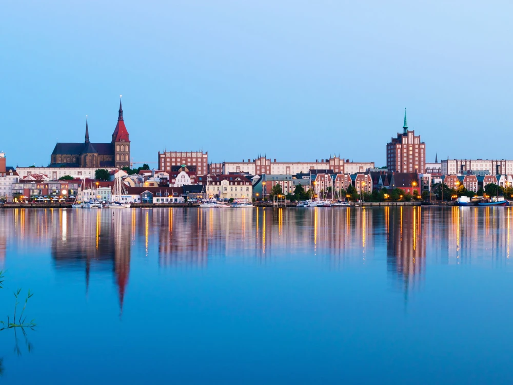 Night Panorama View to Rostock. River Warnow and City port. Mecklenburg-Vorpommern, Germany