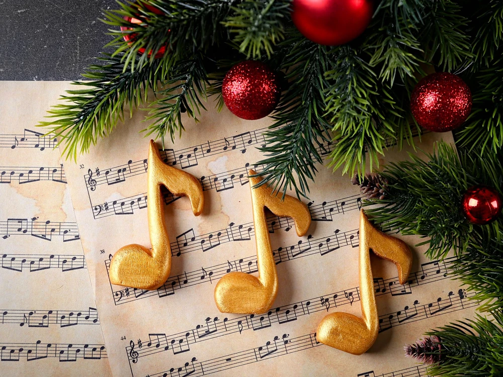 Christmas decorations on music sheets