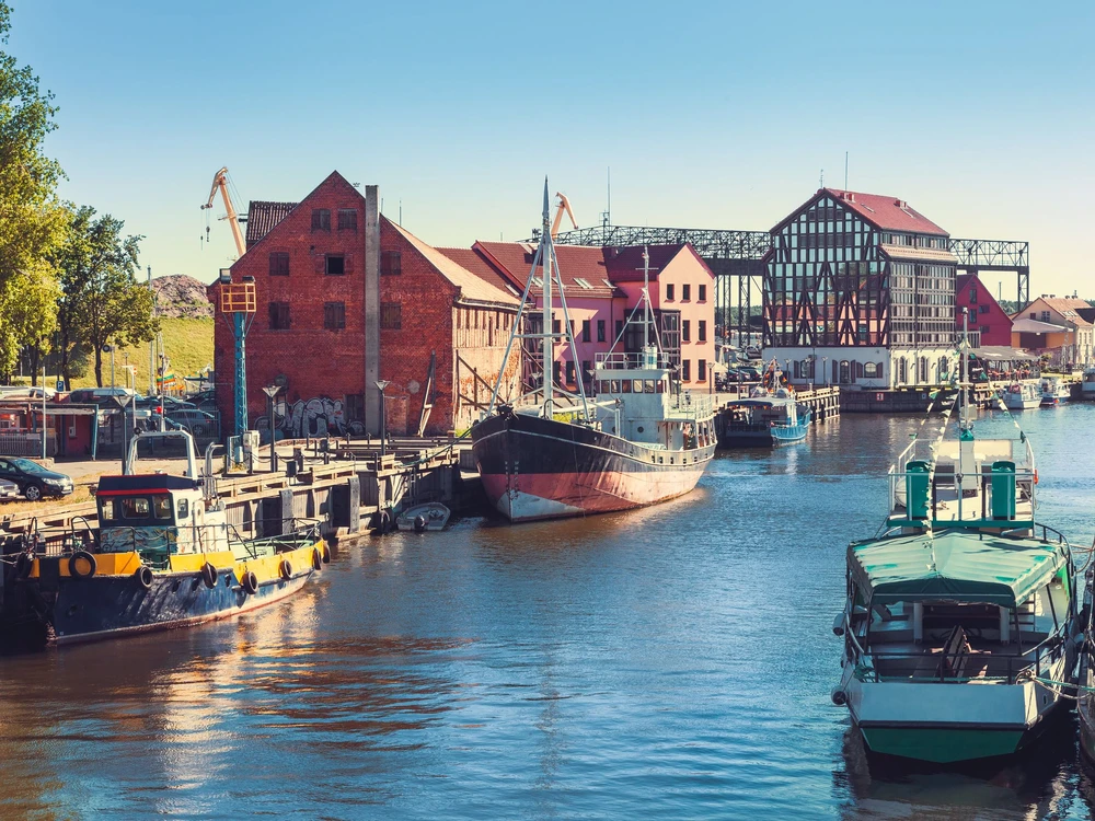 Ships and boats on Dane river in Klaipeda, Lithuania.