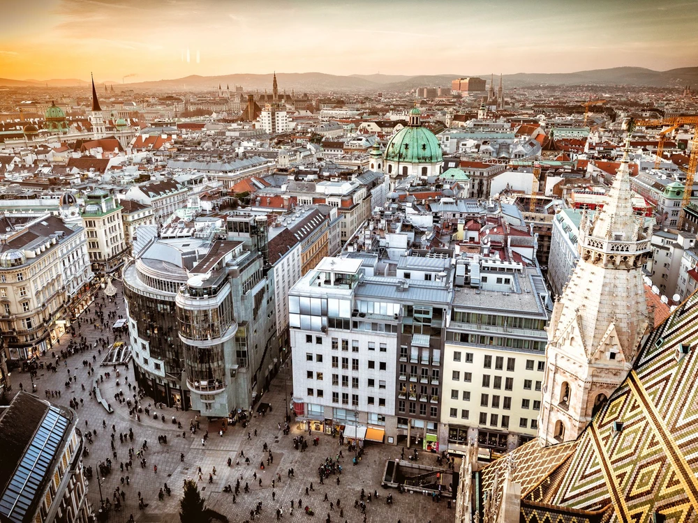 Vienna at sunset, aerial view from above the city
