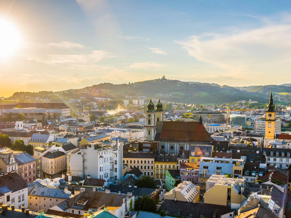 Aerial view of the Austrian city Linz including the old Cathedral, schlossmusem and the postlingberg basilica.