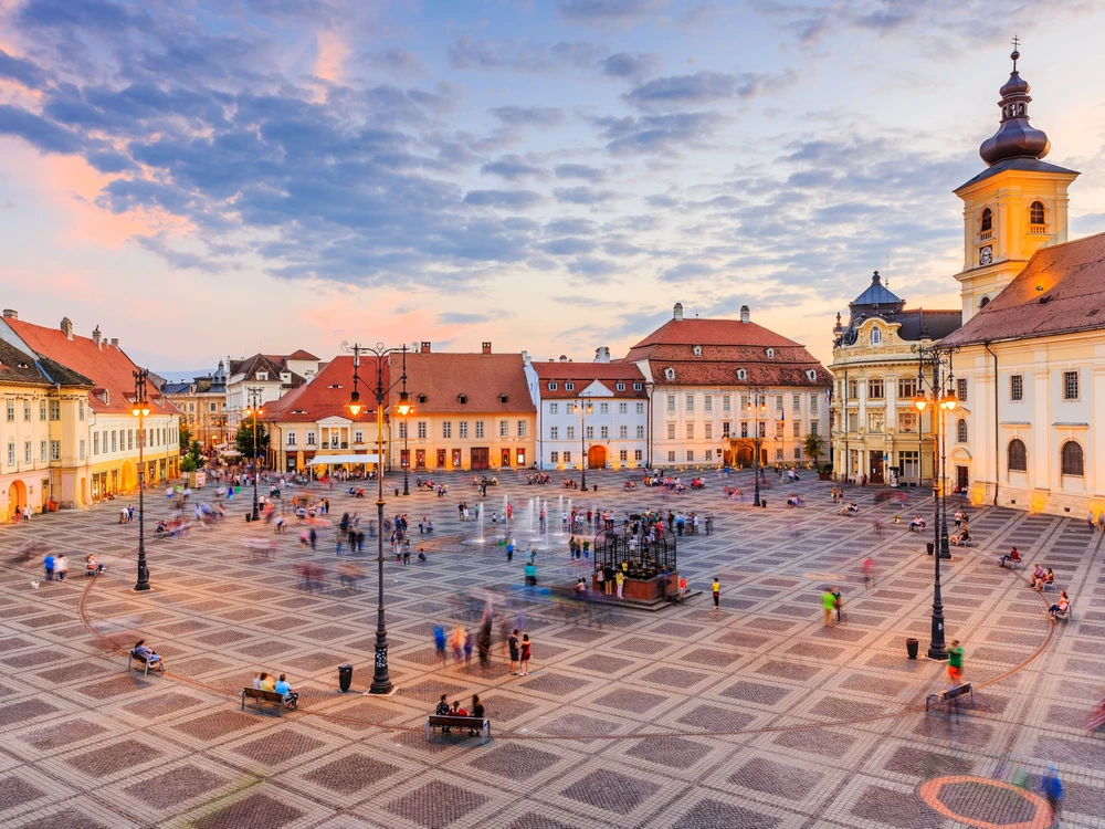 Sibiu, Romania. Large Square (Piata Mare) with the City Hall and Brukenthal palace in Transylvania.