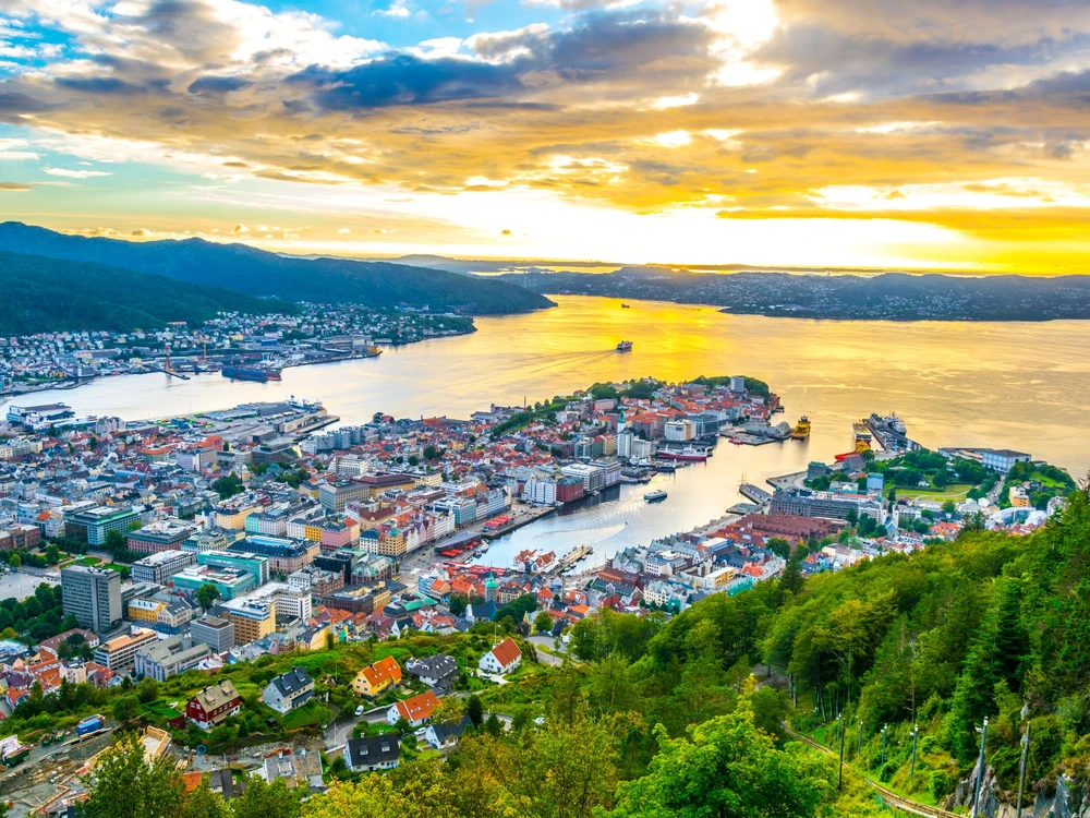 Sunset view on Bergen and harbor from the mountain floyen