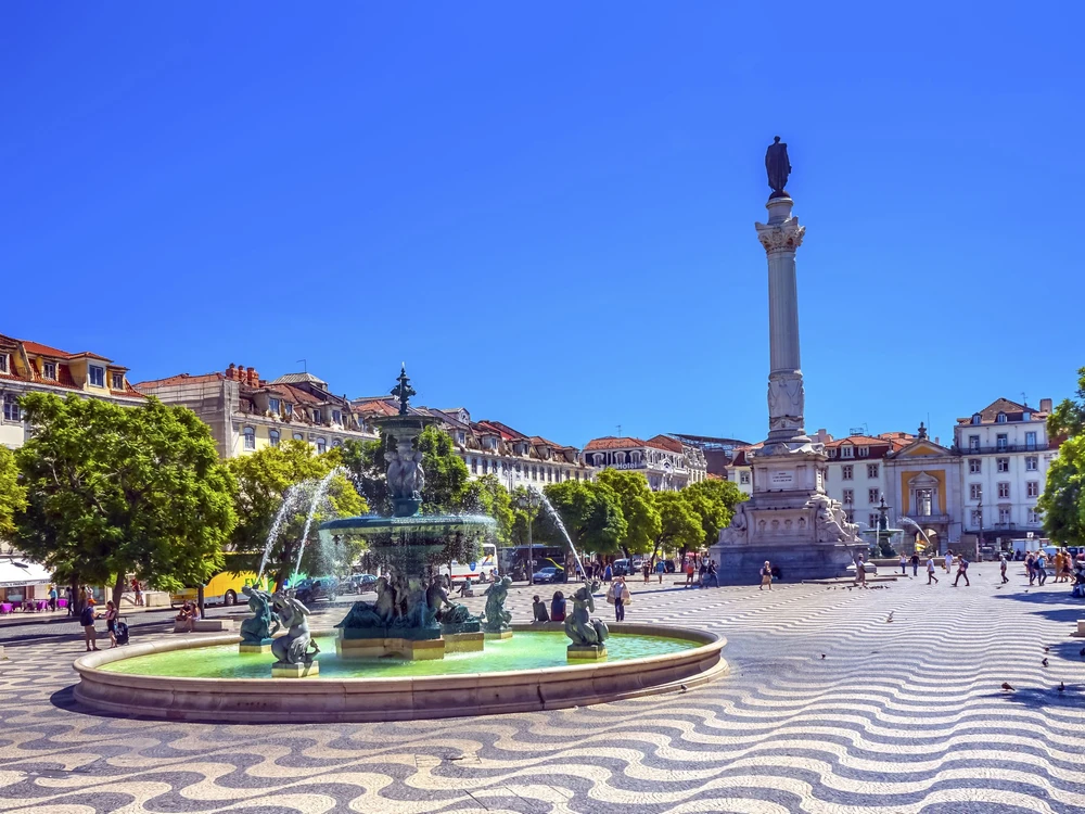 Column Pedro IV Fountain Rossio Square Lisbon Portugal.  Rossio Square is main meeting spot in Lisbon. Column Pedro