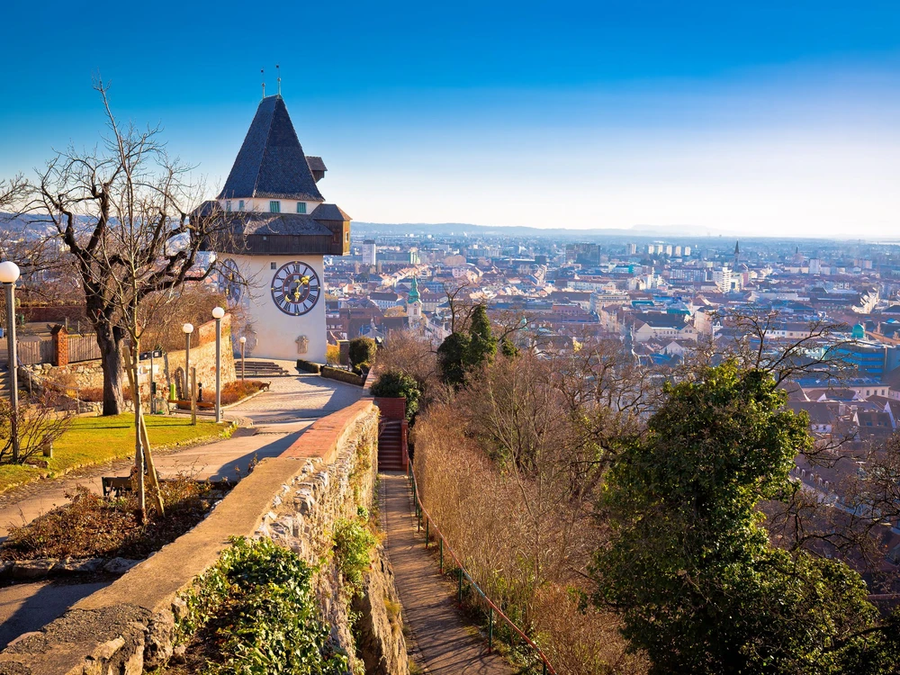 Uhrturm landmark and Graz cityscape aerial view, Styria region of Austria
