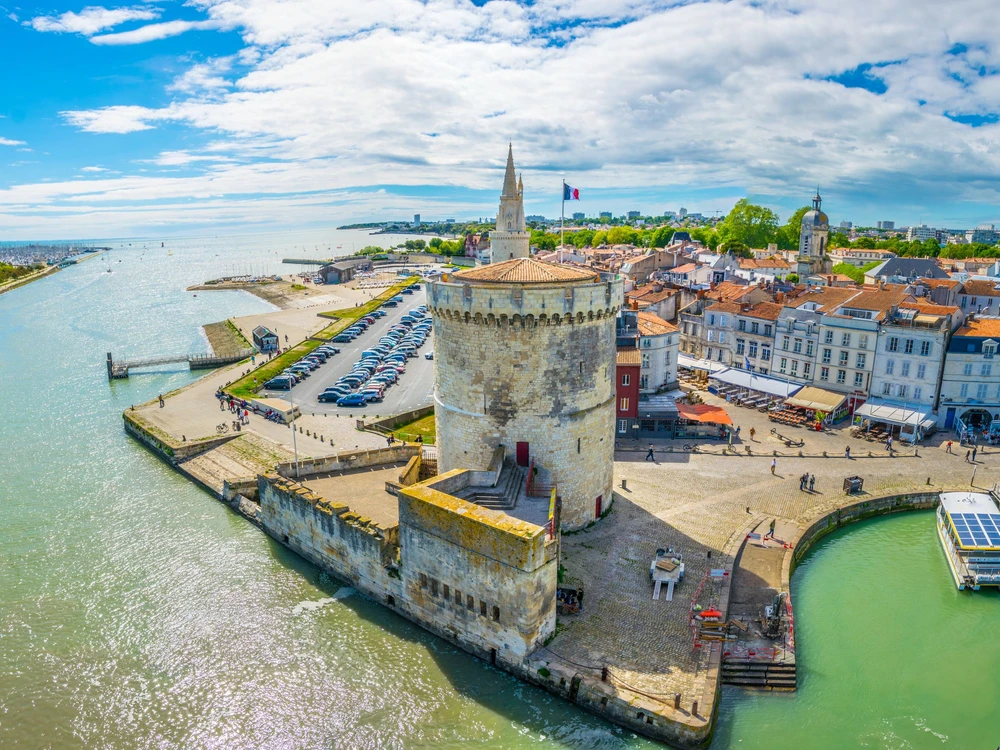 Seaside of La Rochelle dominated by Tour de la Lanterne and tour de la chaine, France