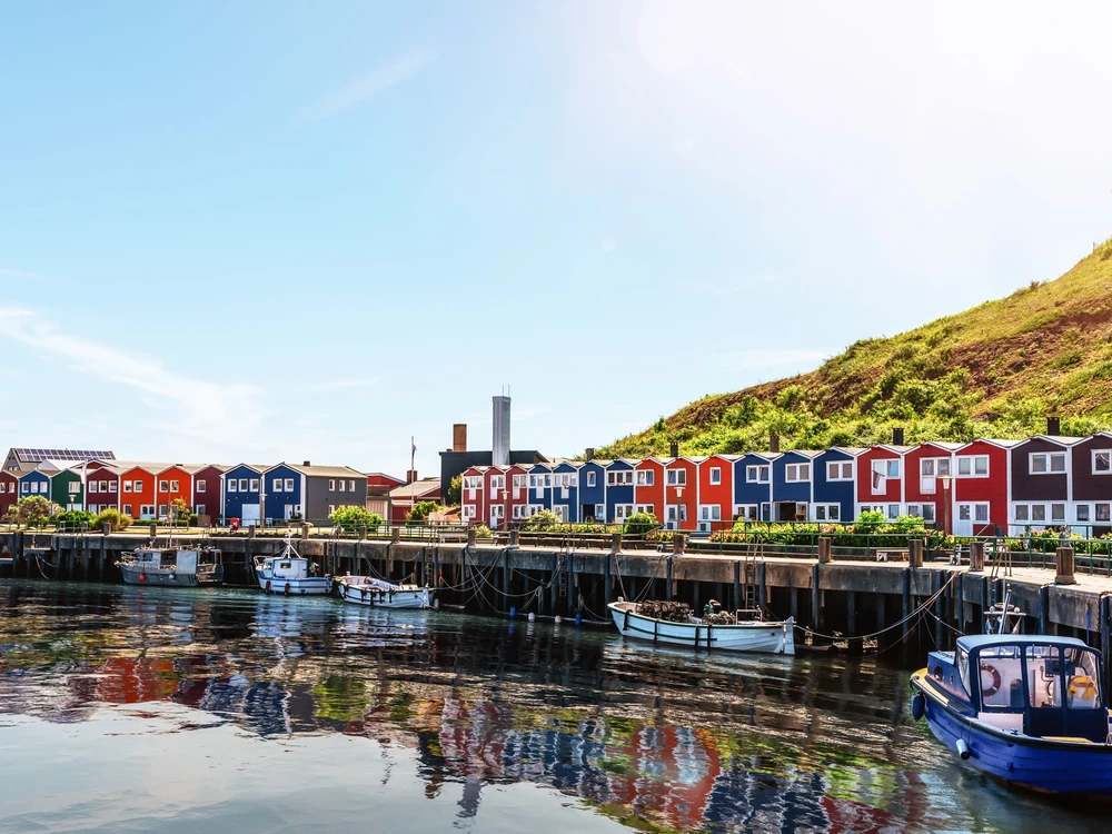 typical colorful houses at waterfront on Helgoland island on sunny day