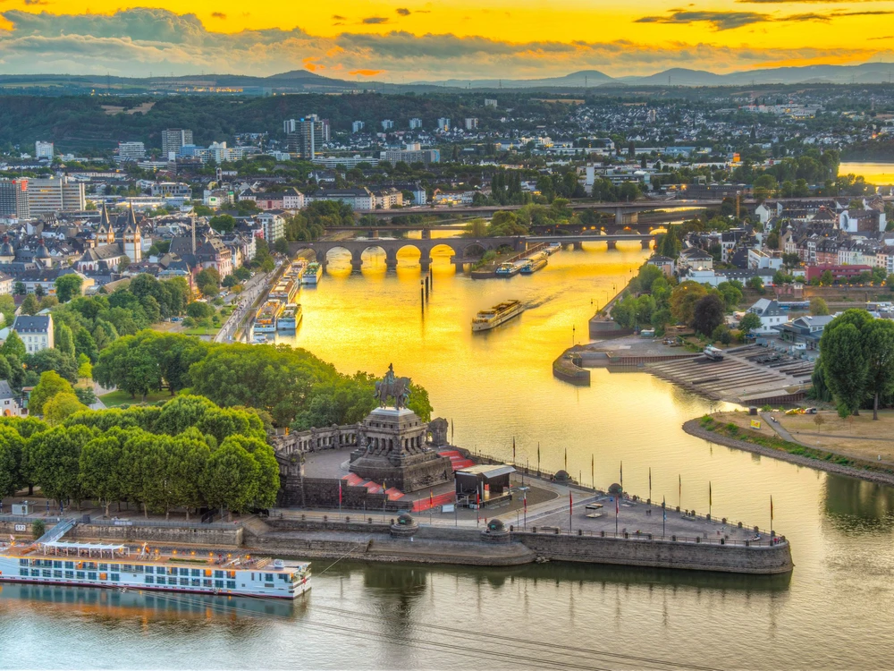 Sunset aerial view of confluence of Rhein and Mosel rivers in Koblenz, Germany