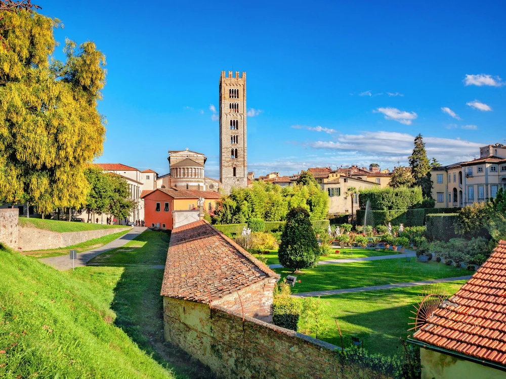 Cityscape with basilica di San Frediano and gardens of palazzo Pfanner in medieval town Lucca.  Tuscany, Italy