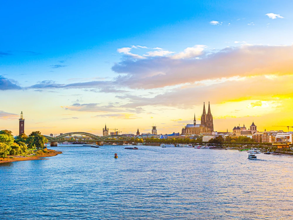 spectacular sunset in cologne with Dome and river Rhine