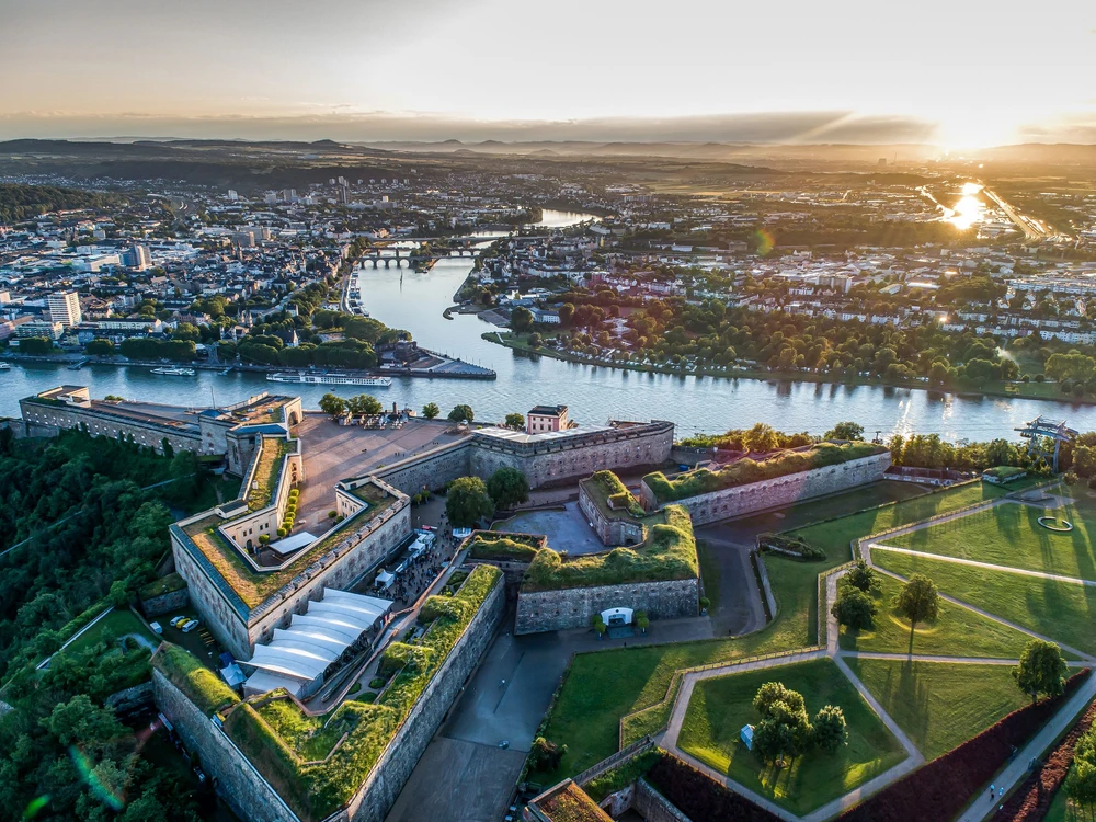 Aerial View of Ehrenbreitstein fortress and Koblenz City in Germany during sunset.