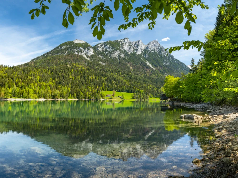 Mountain landscape reflected in the idyllic Hintersteiner See in Tyrol, Austria. Europe