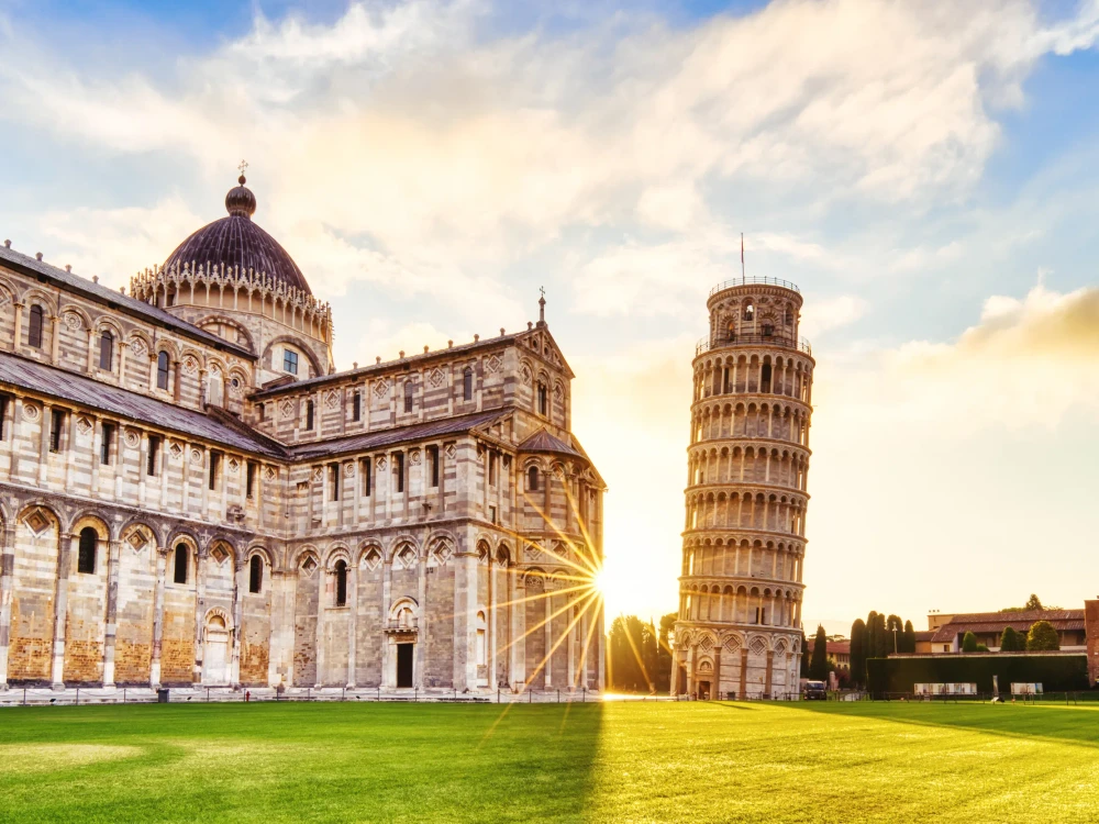 Pisa Leaning Tower Torre di Pisa and the Cathedral Duomo di Pisa at Sunrise, Pisa, Italy             Keywords:                        pisa, tower, leaning, sunset, sunrise, city, italy, cityscape, landscape, cathedral, monument, sunny, sun, tuscany, famous, architecture, blue, building, europe, european, green, italian, landmark, medieval, renaissance, sky, travel, square, ancient, attraction, basilica, church, culture, dome, duomo, historic, history, marble, old, piazza, pisa cathedral, pisa italy, pisa tower, toscana, grass, pisa night, art, urban, torre, white                           SHUTTERSTOCK CAPTION:                       Pisa, Italy - July 4: Pisa Leaning Tower Torre di Pisa on July 4, 2021 in Pisa. Pisa Leaning Tower is a major tourist attraction in Italy.                GETTY CAPTION:               Pisa, Italy - July 4, 2021: Pisa Leaning Tower Torre di Pisa and the Cathedral Duomo di Pisa. Pisa Leaning Tower is a major tourist attraction in Italy.