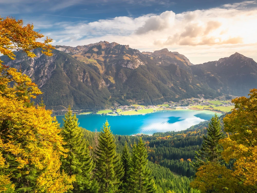 Turquoise Achensee lake near Innsbruck at peaceful and dramatic autumn, Tyrol alps, Austria