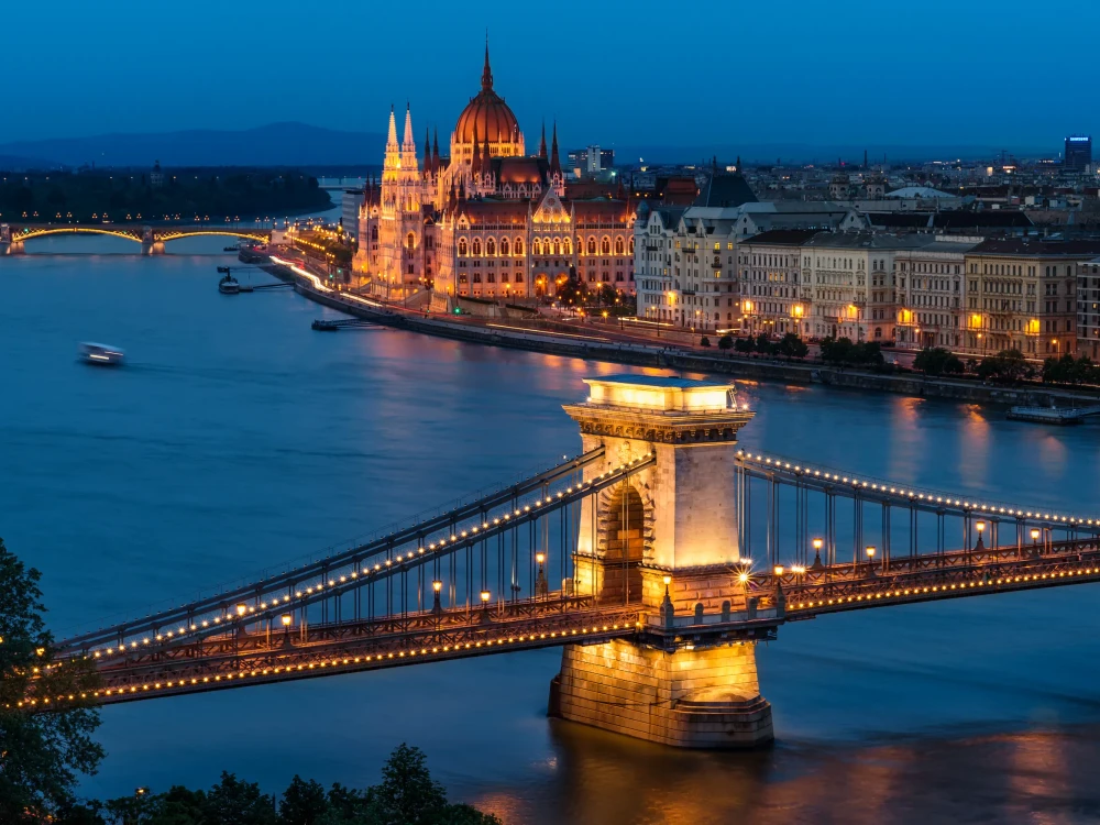 The beautiful Chain Bridge with the Hungarian Parliament in the background during blue hour.