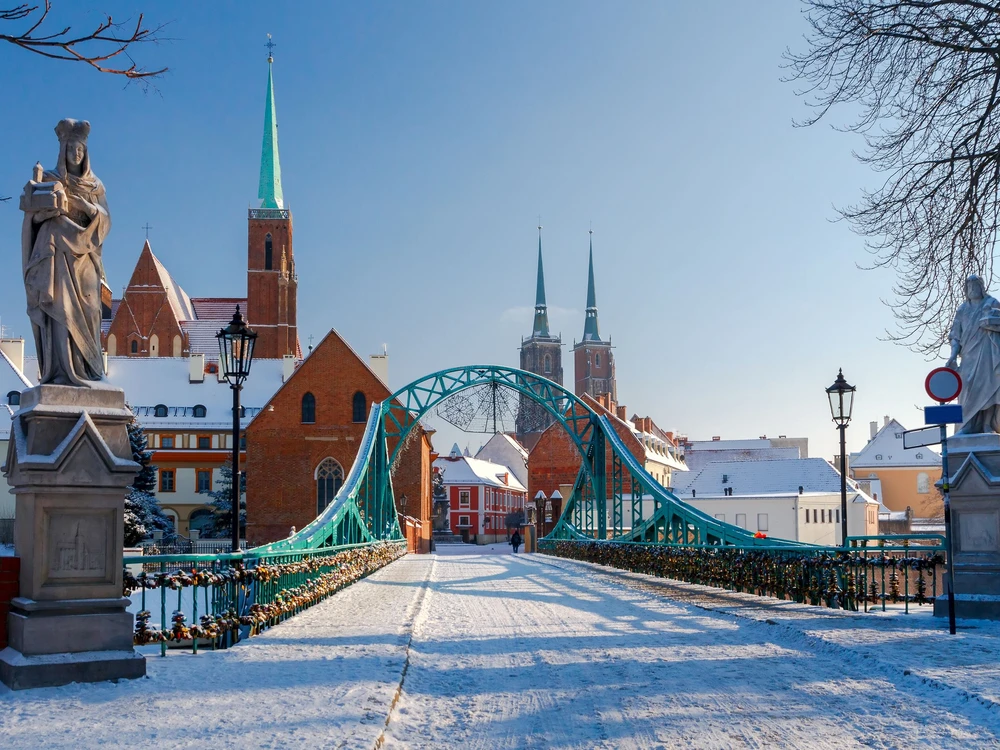 Tumski bridge over the river Odra to the island in winter.