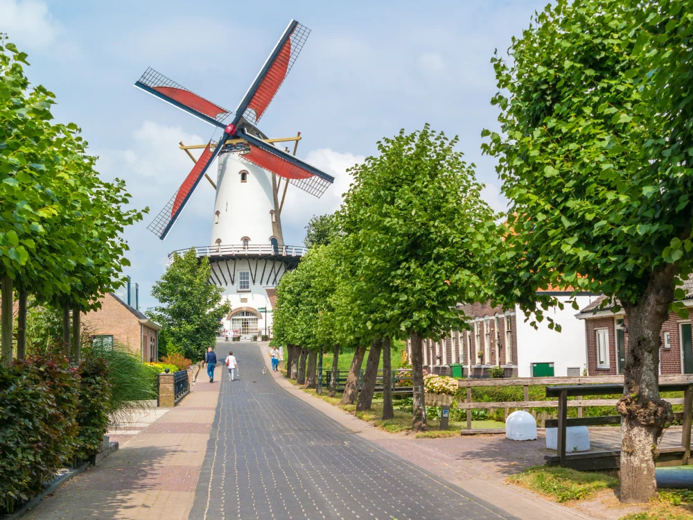 Streetscene with traditional windmill in town of Willemstad, North Brabant, Netherlands