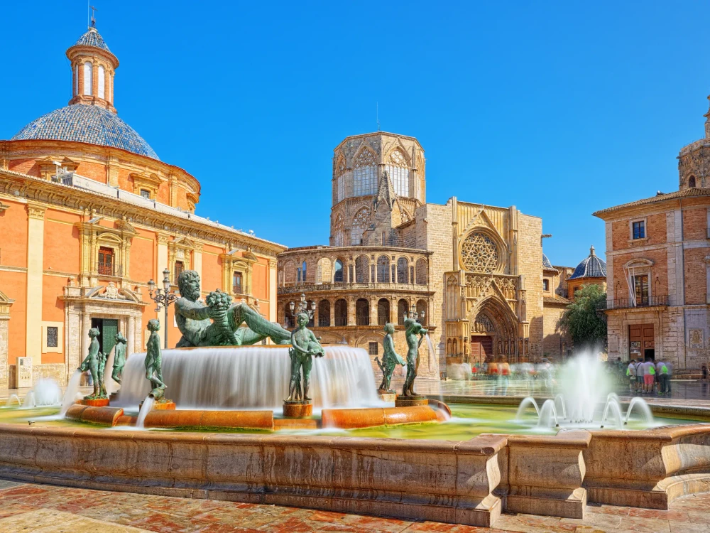 Fountain Rio Turia on Square of the Virgin Saint Mary, Valencia Cathedral, Basilica of Virgen the Helpless.