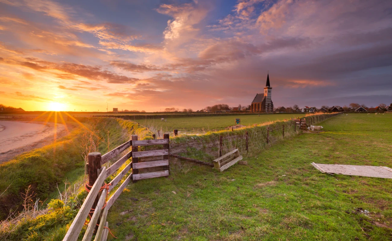 The church of Den Hoorn on the island of Texel in The Netherlands at sunrise.