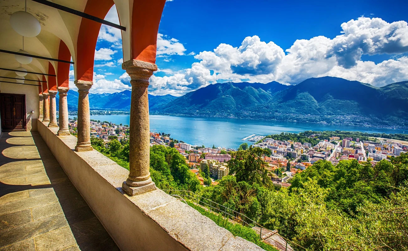 Beautiful view to Locarno city, lake Maggiore (Lago Maggiore) and Swiss Alps from Madonna del Sasso Church in Ticino, Switzerland.