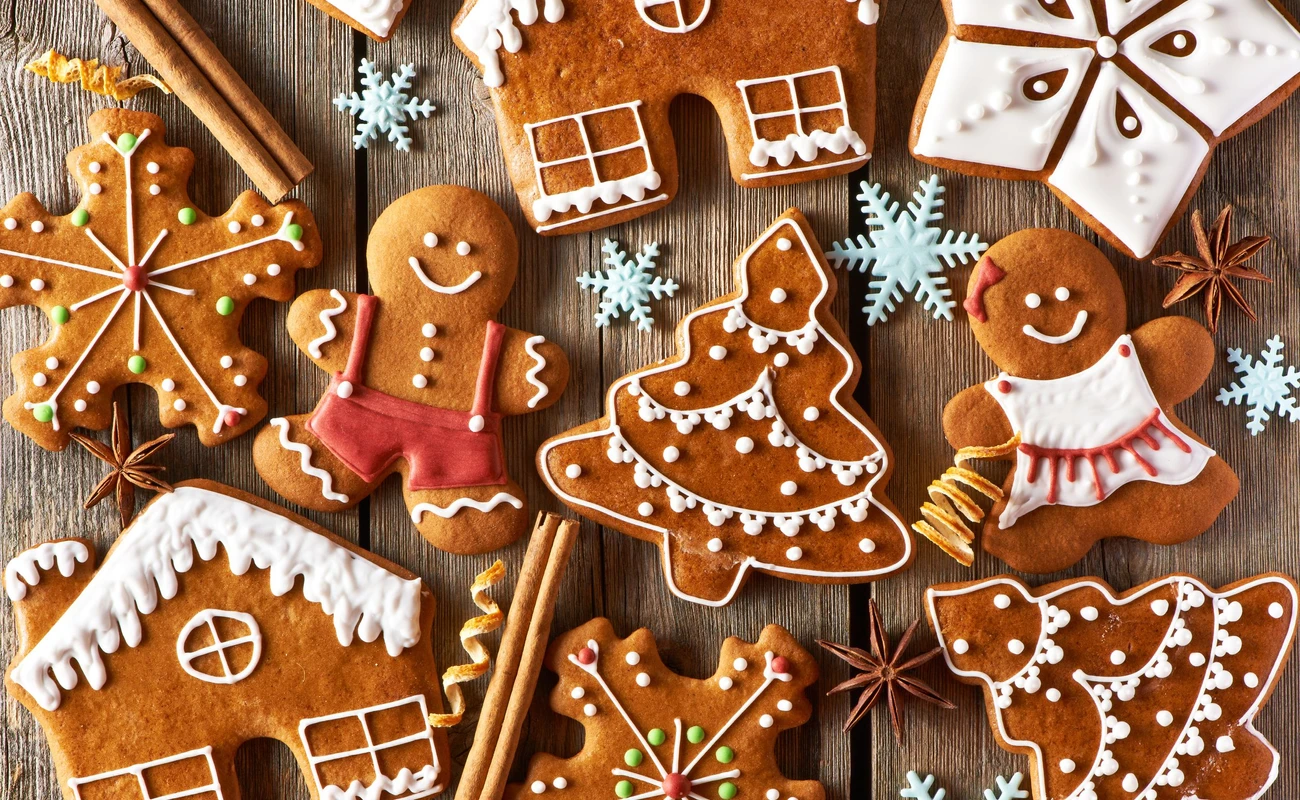 Christmas homemade gingerbread cookies on wooden table